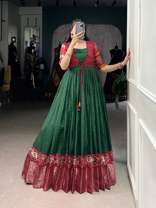 Green Color Patola Print With Weaving Work Border Tasar Chex Gown By Yana Fab