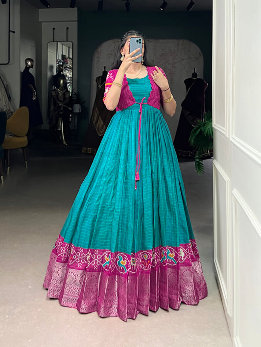 Firozi Color Patola Print With Weaving Work Border Tasar Chex Gown By Yana Fab