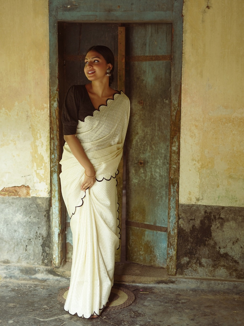 Off White Color Gadhawal Chex Material & Arca Work Saree